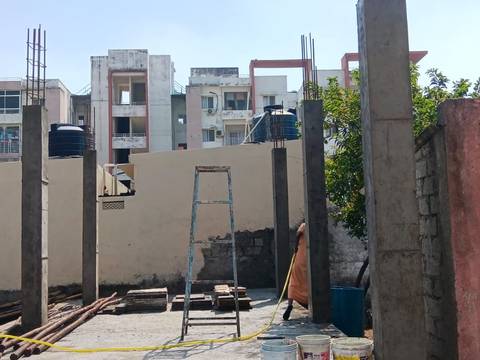 Columns and walls going up at a house site